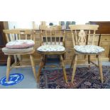 Three dissimilar beech/pine chairs with solid seats, raised on turned legs