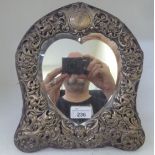 An Edwardian pressed silver over fabric dressing table mirror, on an easel back  London 1901  10"h