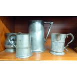 Antique pewter: to include a one gallon measure; and a quart size pouring mug