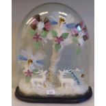 An early 20thC glass sculpture, featuring exotic birds, stags and flora, displayed under an oval