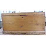 An early 20thC scratch built pine trunk with straight sides and a hinged lid, on a plinth  20"h