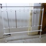 A Victorian style white painted cast iron and brass bed frame  the headboard 60"w