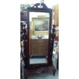 A modern Victorian design mahogany framed cheval mirror with two base drawers, raised on turned legs