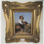 Attributed to Penny Williams - a painted porcelain plaque, depicting a young Bavarian man  15" x 7"