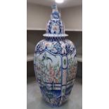 A late 19th/early 20thC European china vase and cover, decorated with birds and flora  31"h overall
