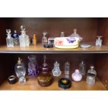 A collection of mainly glass dressing table scent bottles, some with silver collars  mixed marks &