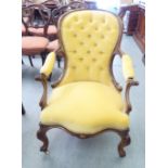 A late Victorian walnut framed salon chair, later fabric button upholstered in pale yellow fabric,