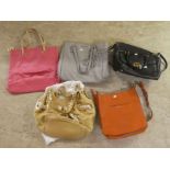 Five Michael Kors handbags  various design