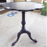 An early 20thC Georgian design, later painted, pedestal table, raised on a splayed tripod base,