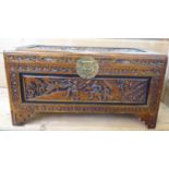 A mid 20thC Chinese camphor wood carved crest, raised on bracket feet  14"h  27"w