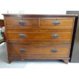 An Edwardian mahogany four drawer dressing chest, raised on bracket feet  31"h  42"w