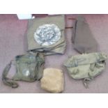 A khaki cap; two haversacks; associated equipment; and a pair of military style black hide riding