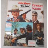 Film poster collages: to include John Wayne in 'Big Jake'  laid on card  29" x 31"