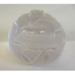 A cut glass rose design paperweight by Peter Dreiser with a separately inset intaglio, featuring