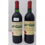 Wine, two bottles of Chateau Pavie 1983 and 1985