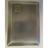 An Asprey & Co silver, folding cigarette case with chamfered sides and engine turned decoration,