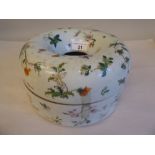 A 19thC Chinese porcelain doughnut shape two part spittoon, decorated with flora and insects  8.75"