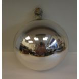 A 19thC silvered glass witches ball, on a pendant hook  11"dia