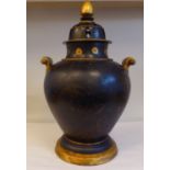 A late 19th/early 20thC Oriental matt black and gilded pottery, twin handled baluster pot pourri