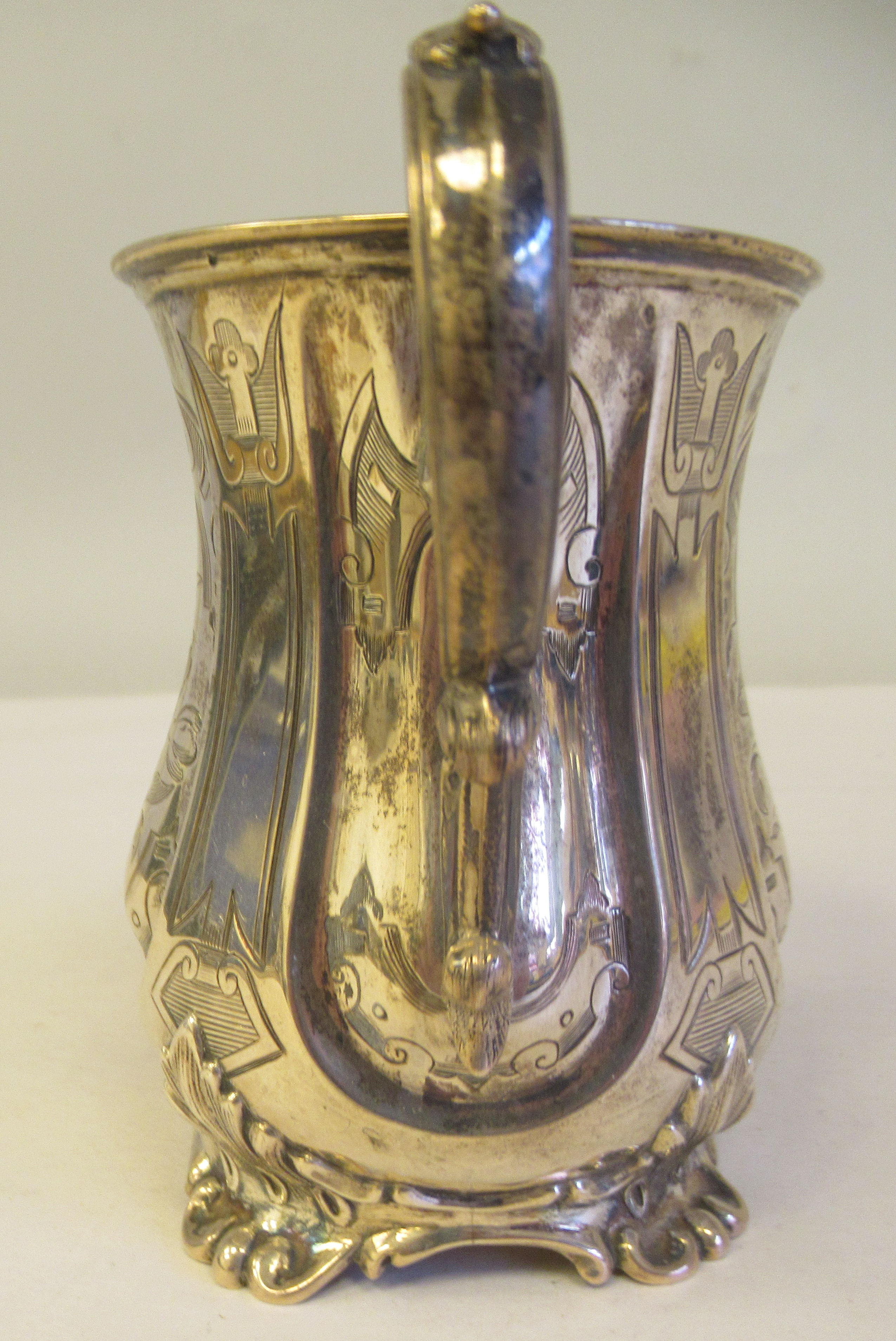 A mid Victorian silver Christening mug of waisted form with a double C-scrolled handle and bright - Image 2 of 6