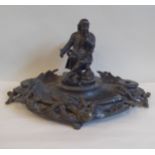 A late 19thC bronze inkstand with trailing acorns and oak leaves and wreathed torch, a pair of ink