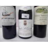 Wine, a bottle of 1993 Chateau Troplong Mondot; a 1989 Chateau Beychevelle; and a 1990 Nuits St