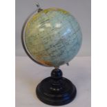 A vintage Philips 6" Terrestrial Globe, rotating on a metal frame and a turned, ebonised base