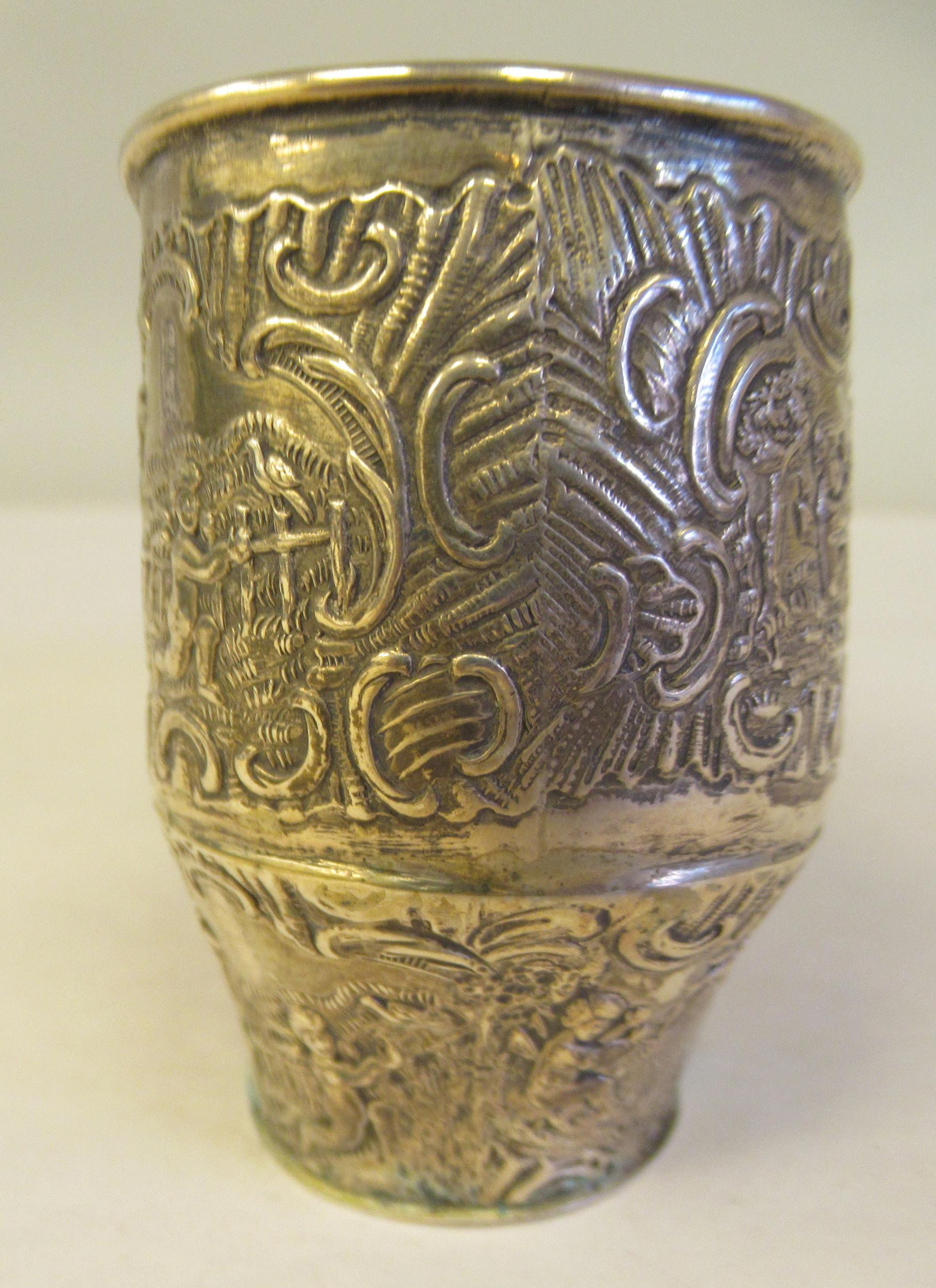 A Dutch silver coloured metal ornament, in the form of a lady's shoe, allover cast and chased with - Image 3 of 6