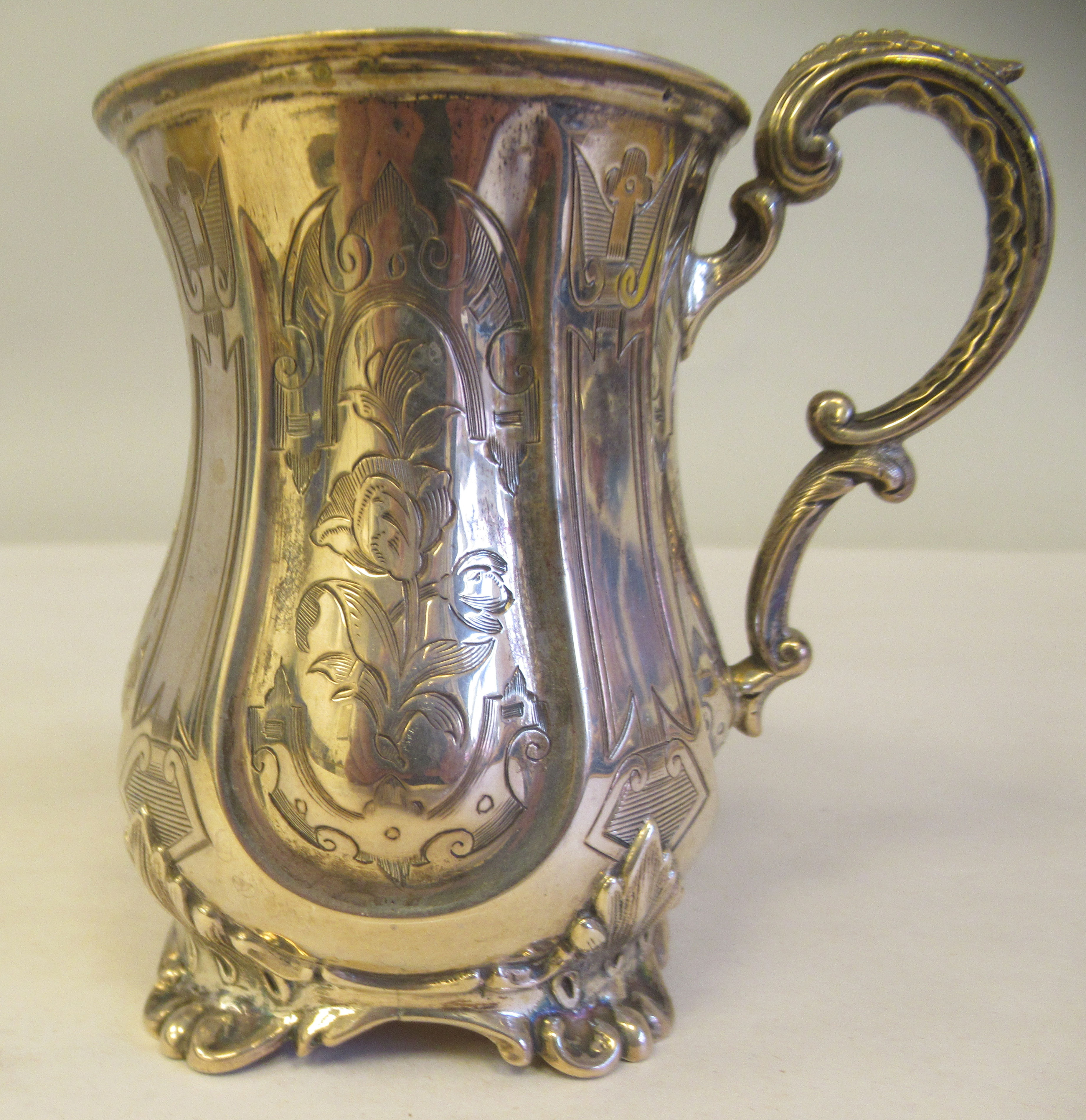 A mid Victorian silver Christening mug of waisted form with a double C-scrolled handle and bright - Image 3 of 6