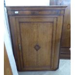 A George III oak corner cabinet  40"h  32"w