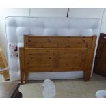 A modern pine double bedframe, the headboard 58"w with a Snuggle mattress  52"w