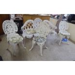 A Victorian style white painted cast iron three person terrace bench  54"w; and three similar