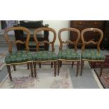 A set of four late 19th/early 20thC mahogany framed balloon and bar back dining chairs, the green