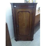 A George III oak corner cabinet  52"h  31"w