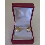 A pair of gold coloured metal and cultured pearl earrings