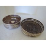 Two silver wine bottle coasters  mixed marks  5" & 5.5"dia