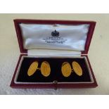 A pair of 18ct gold, oval tablet and chain cufflinks  cased