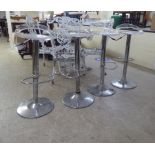 A set of four bar stools, each with a Ghost design Perspex seat, on a chromium plated pedestal