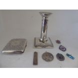 Silver collectables: to include a folding cigarette case with scroll engraved decoration; and a bead