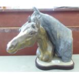 A Lladro porcelain group, two horses' heads  11"h