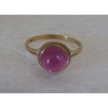 A 9ct gold cabochon set ruby ring