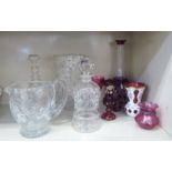 Glassware: to include a late Victorian cranberry and white glass cameo vase, decorated with flora