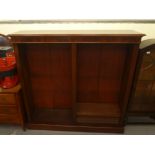 A Victorian style mahogany twin section, open front bookcase with eight height adjustable shelves,