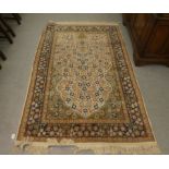 A Persian prayer rug, profusely decorated with flora, on a multi-coloured ground  50" x 76"