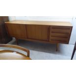 A possibly Rosengaarden teak sideboard with two sliding doors, beside a bank of four drawers, raised