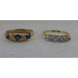 Two 18ct gold rings, one set with five round cut diamonds; the other set with alternating