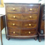 A late 19thC mahogany bow front, five drawer dressing chest, raised on turned feet  49"h  42"w