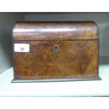 A late 19thC burr walnut veneered and ebony string inlaid desktop stationary box, the hinged,