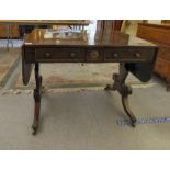 A Regency brass inlaid rosewood sofa table with two frieze drawers and two facsimiles on the