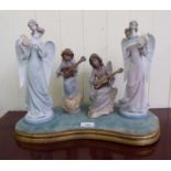 Lladro porcelain ornaments: to include four angelic figures  tallest 9"h